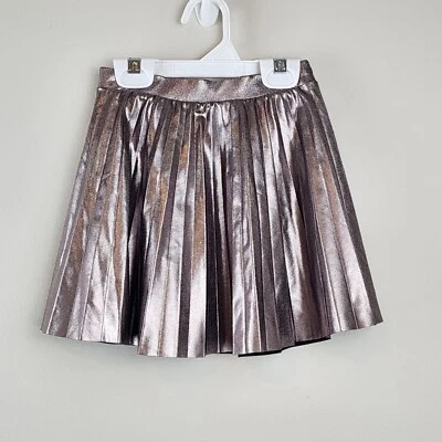 Mini-saia plissada Zara tamanho 6 meninas metálica - Imagem 1 de 4