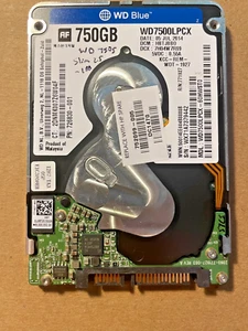 WD SLIM 750G WD7500LPX-60HWST0 DCM:HBTJBBO DCX:7H04W7RS9 05JUL14 -TestedWorking! - Picture 1 of 3