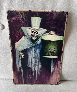 DISNEY HAUNTED MANSION HATBOX FANTASMA HOJALATA METAL LETRERO 8"X12" - Imagen 1 de 2