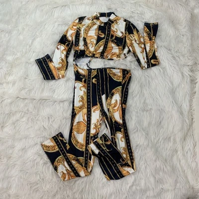 mono negro oro corte mediano Foto 1 de 2