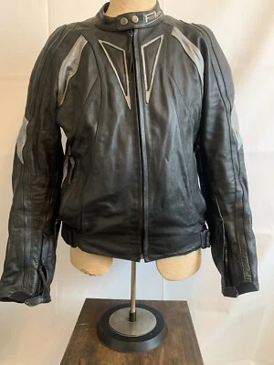 Chaqueta de motocicleta First Racing mediana para hombre aislada acolchada negra usada Foto 1 de 4