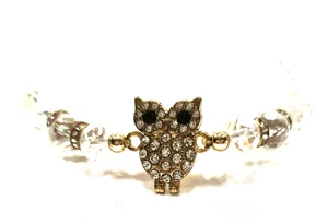 Pulsera elástica para mujer con dije de búho de cristal cuentas de acrílico transparente espaciadores en tono dorado - Imagen 1 de 15