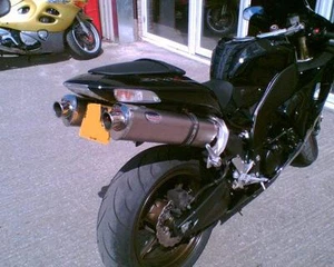 Escape legal de carretera para Kawasaki ZX10R 06-07 titanio tri-ovalado - Imagen 1 de 3