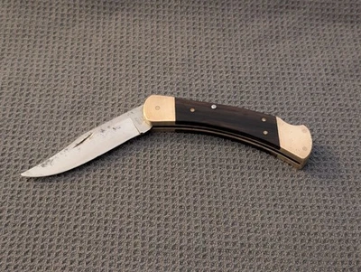 Cuchillo plegable vintage BUCK 110 4 puntos EE. UU. 1981-86 Foto 1 de 4