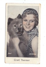 Gretl Theimer  with a dog.  Cigarette cards 1930s
