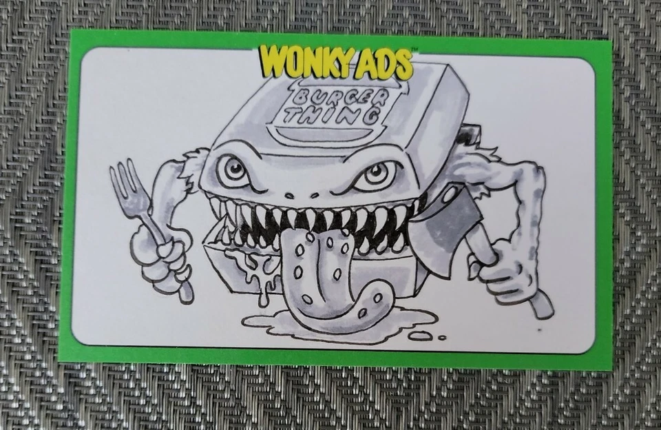 2022 Topps Wacky Packages Wonky Ads Serie 2 Boceto Joey Fitchett Yoga Demon Foto 1 de 2