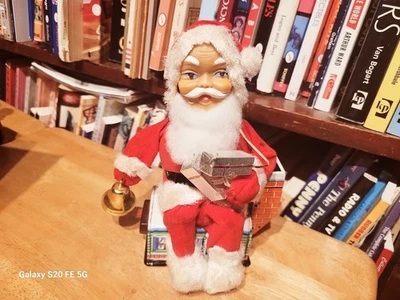 BOM PAPAI NOEL OPERADO POR BATERIA DOS ANOS 1950 TOCANDO UM SINO E OLHOS ILUMINADOS COM CAIXA - Imagem 1 de 4