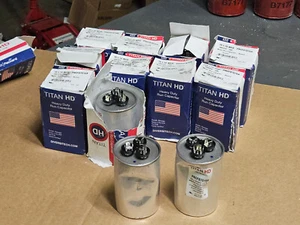 Lot of 12 TITAN HD PRCFD7010A Dual Run Capacitor,70/10 MFD,4 13/32"H (Damaged) - Picture 1 of 7