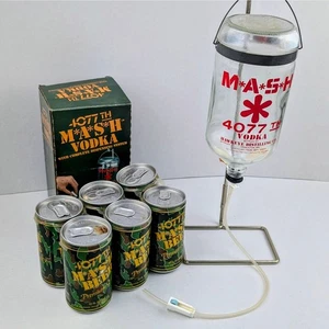 Vintage MASH 4077th Vodka IV Bottle Dispenser w/ Empty Beer Cans & Original Box - Picture 1 of 9