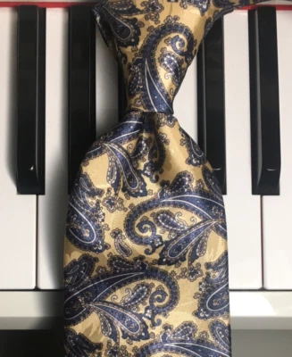 Corbata de poliéster VAN HEUSEN / Paisley azul ocupado en un campo figurado de cálido marfil Foto 1 de 4