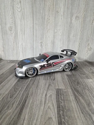 VITNAGE JADA TOYS 1:10 TOYOTA SUPRA SILVER R/C CAR IMPORT TUNER JDM  - Image 1 of 4