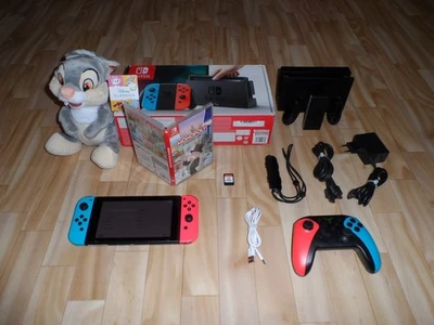 Nintendo Switch Konsole Neon Rot Neon Blau in OVP + Controller + Spiel - Bild 1 von 4