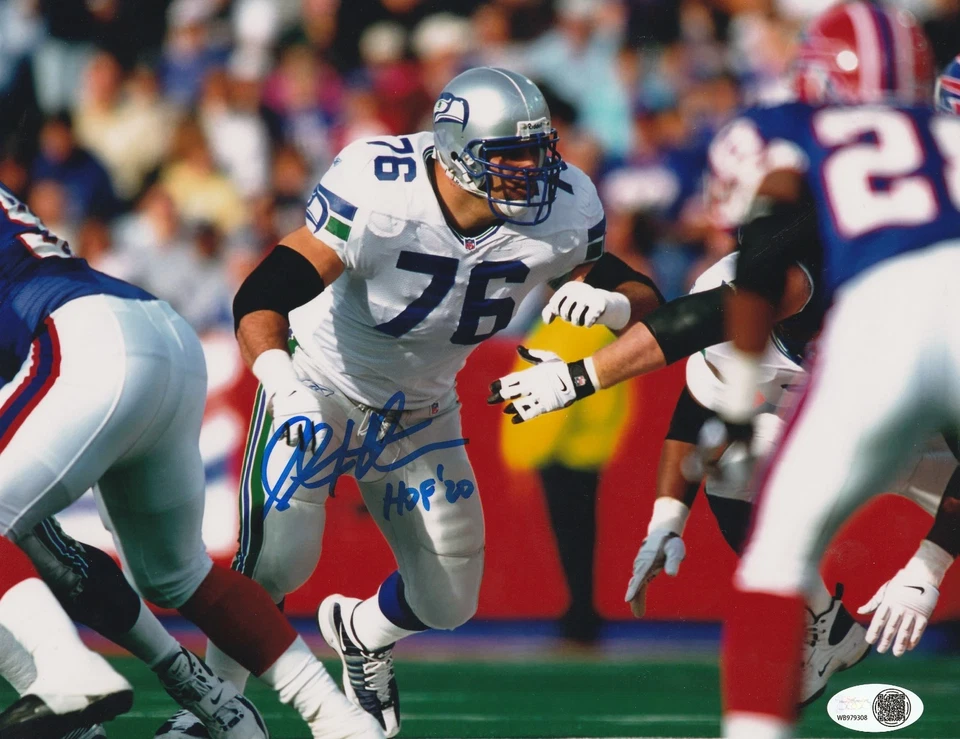 STEVE HUTCHINSON SEATTLE SEAHAWKS HOF 20 JSA AUTHENTICATED ACTION SIGNED 8x10 - Image 1 of 1