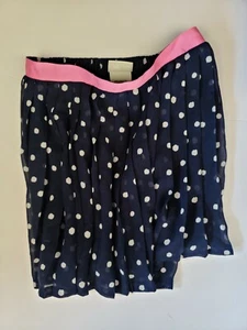 Skirt features a fun polka dot pattern and a ruffle accent - Picture 1 of 4