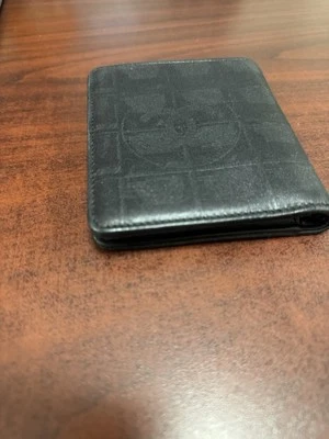 Cartera plegable Chanel negra de nailon y cuero Foto 1 de 3