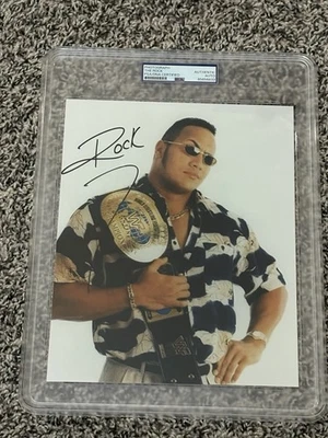 “THE ROCK” DWAYNE JOHNSON SIGNED AUTOGRAPHED 8X10 WWE PHOTO PSA/DNA CERTIFIED - Image 1 of 2