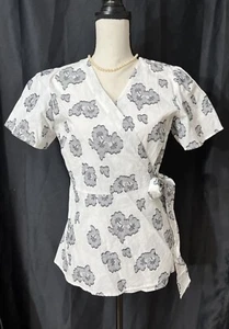 BLUSA MUJER ANN TAYLOR TALLA 6 NUEVA CON ETIQUETAS FLORES BLANCAS Y NEGRAS Precio de venta sugerido por el fabricante 79,50 USD. - Imagen 1 de 7