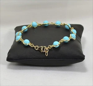 Pulsera De Oro Amarillo 18 kt Con Bolitas De Pasta Turquesa Saturno OGRP 066 - Imagen 1 de 3