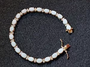 Bracciale tennis - placcato oro 18k - set punte - pietre finte - Opel finta ? - lungo 7,5 pollici - Foto 1 di 9