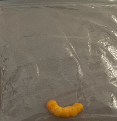 Pequeño Cheeto puff Foto 1 de 4