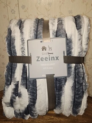 Manta de piel difusa 60 X 90 gris Foto 1 de 3