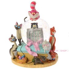 Disney snow globe fashionable cat doggie story alice in wonderland