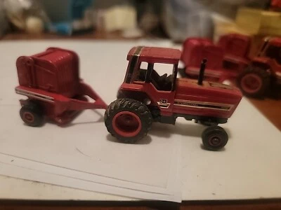 3-Vintage ERTL 1/64 Red International 5088 Tractors & Case IH 2400 Hay Balers  - Image 1 of 3