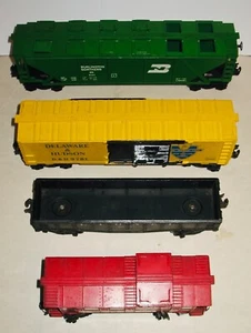 4 Vintage Lionel 0 Gauge Freight Cars~Caboose~Cattle Car~Grain Car~Post War 50's - Picture 1 of 12