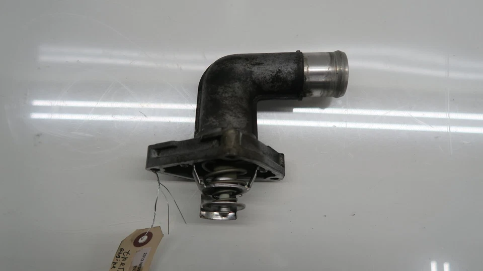 2011-2017 Nissan Quest OEM 3.5L Engine Thermostat - Image 1 of 4
