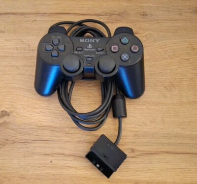 Manette PS2 DualShock 2 Officielle - Couleur Silver - Occasion Fonctionnelle - Pour PlayStation 2