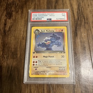 PSA 7 NM - 2000 Pokemon Dark Machamp #10/82 1st Edition Team Rocket Rare Holo