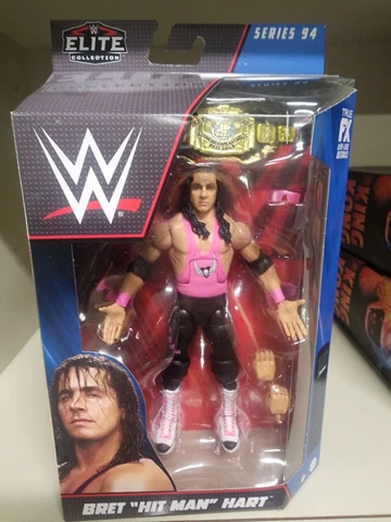 WWE ELITE SERIES 94 BRET HITMAN HART  ACTION FIGURE.  BLACK TRUNKS. NEW Cover