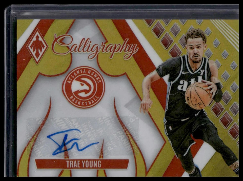 2023-24 Panini Phoenix #CG-TRY Trae Young Calligraphy Gold #/10 - Image 1 of 2