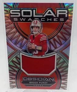 2024 Panini Obsidian - Solar Swatches Brock Purdy #SS-BPY Silver /99 (MEM) - Picture 1 of 2