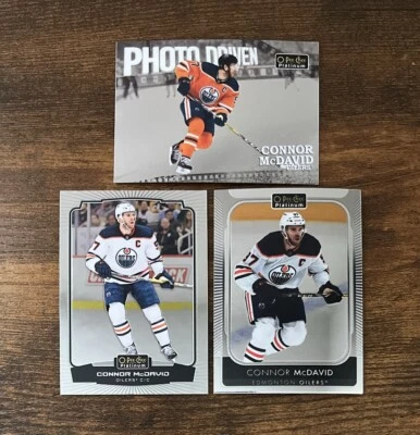 2022-23 O-Pee-Chee Platinum #97 Photo Driven & 21-22 #1 Connor McDavid Oilers - Image 1 of 2
