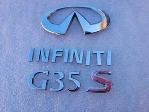 🚘 2003 2004 2005 2006 INFINITI G35 S SEDAN 4 DOOR REAR TRUNK DECK LID EMBLEMS - Picture 1 of 2