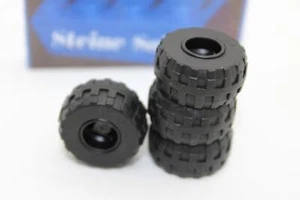 Lego (c) 4x Reifen - 6014 - Gummi - schwarz - Truck - 24x12 - Bild 1 von 1