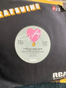 Dolly Parton.  Here you come again.  7”single. . RCA records  1977 - Picture 1 of 2