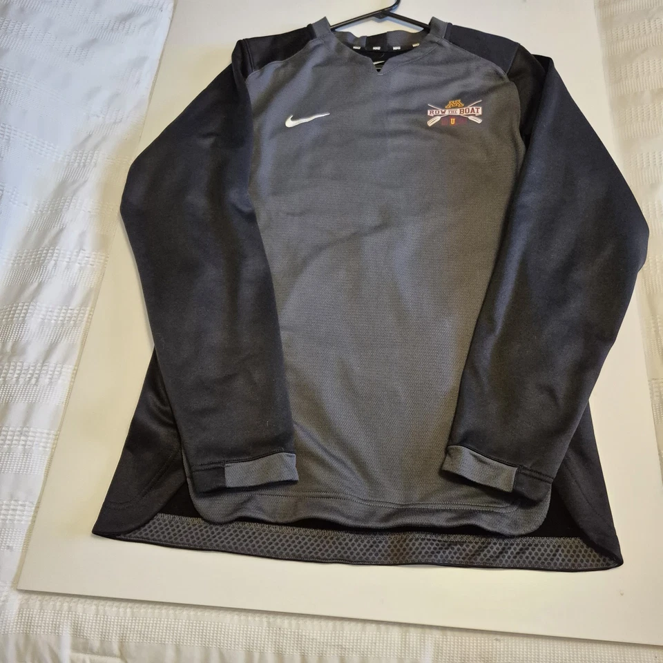 Pullover cuello en V de remo emitido por el equipo Nike para hombre talla M Foto 1 de 4