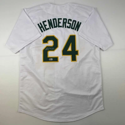 Jersey blanco autografiado/firmado Rickey Henderson Oakland Beckett certificado de autenticidad BAS Foto 1 de 4