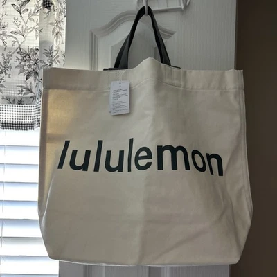 NWT LULULEMON Double Handle Canvas Tote Bag Natural Black Straps 17L Sold Out - Image 1 of 4