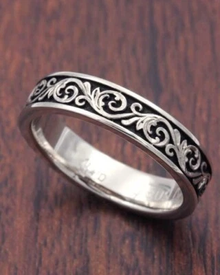 Banda real de oro blanco de 10 quilates con esmalte negro diseño floral occidental para hombre Foto 1 de 2