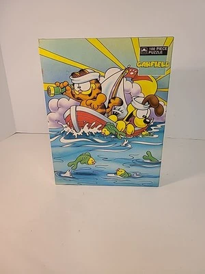 RARO Rompecabezas Dorado Garfield Boat Odie 1978 De Colección 100 Piezas Nuevo Sellado Foto 1 de 4