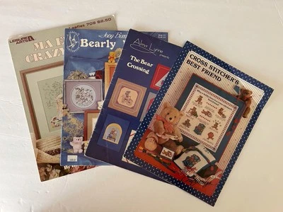 (Lot of 4) LEISURE ARTS PEGASUS ALMA LYNNE CRAFTWAYS BEARS Cross Stitch Patterns - Image 1 of 4