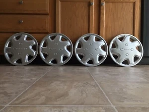 (4) OEM USED 1994-95 Subaru Justy 12" hubcaps wheel covers #60523 28811KA310 - Picture 1 of 16