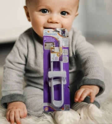 Paquete de 2 cerraduras correderas Dream Baby seguridad infantil blancas puertas de gabinete seguras Foto 1 de 3