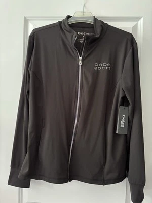 Chaqueta deportiva Bebe nueva con etiquetas talla XL estrás adornada con elástico, cremallera y bolsillos Foto 1 de 4