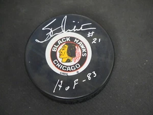 STAN MIKITA 21 SIGNED CHICAGO TEAM PUCK W/ HOF 83 INSCRIPTION - STAN MIKITA COA - Picture 1 of 2