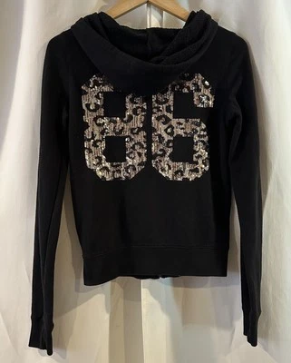 Sudadera con Capucha de Colección Victoria's Secret ROSA Estampado de Guepardo Lentejuelas Bling Cremallera Completa Negra 86 XS Foto 1 de 4