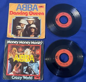 (2) VTG Abba GERMAN 45/7" SINGLE VINYL RECORD+PICTURE SLEEVE Money/Dancing Queen - Imagen 1 de 2